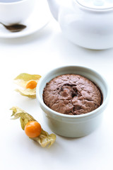 Hot chocolate pudding with fondant centre on white table