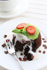 Hot chocolate pudding with fondant centre with ice-cream,
