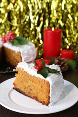 Slice of cake covered cream with Christmas decoration