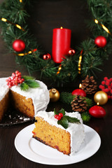 Slice of cake covered cream with Christmas decoration