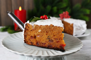 Slice of cake covered cream with Christmas decoration