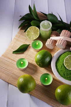 Spa composition with lime and bowl of sea crystals