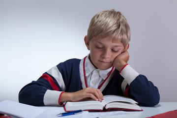 Schoolchild writing book