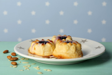 Delicious cheesecake on table, on color background