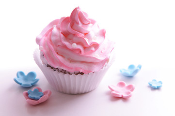 Delicious cupcake isolated on white