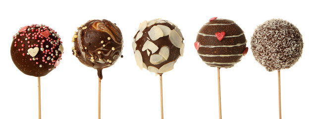 Tasty cake pops, isolated on white
