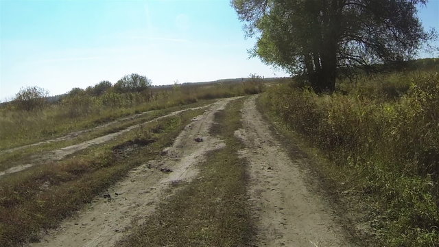 Running on  rural  autumn road. POV stabilized  clip