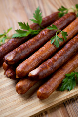 Sausages with parsley, close-up, vertical shot