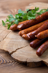 Close-up of smoked sausages with parsley