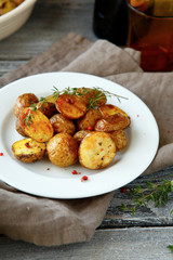 tasty baked potatoes on a plate
