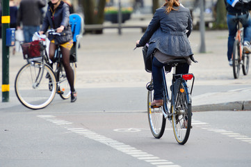 Fototapeta na wymiar Woman on bike