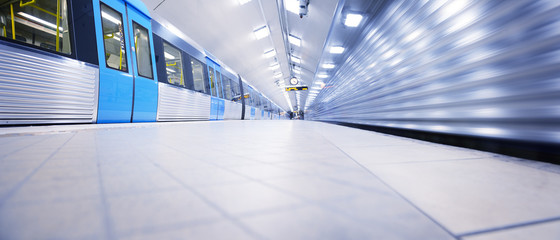 Train arriving to subway station platform