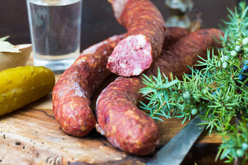 homemade sausage on cutting board - 75295103