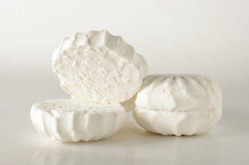 Open and close marshmallows isolated on the bright background