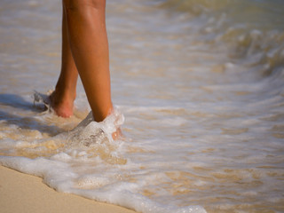 Woman walking on the beach