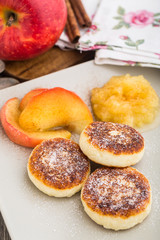 Naklejka na ściany i meble Cheese pancakes with baked apples