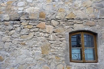 Fototapeta na wymiar Old brick wall with window