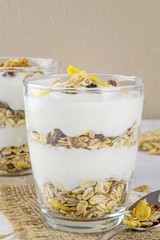 A healthy breakfast muesli and yoghurt mix layered in a glass