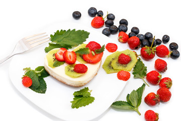 Cheesecake decorated with fresh berries