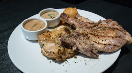 Pork chop and chicken with gravy