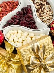 almonds in chocolate, cranberries and walnuts