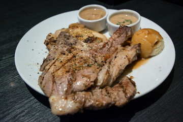 Pork chop and chicken with gravy