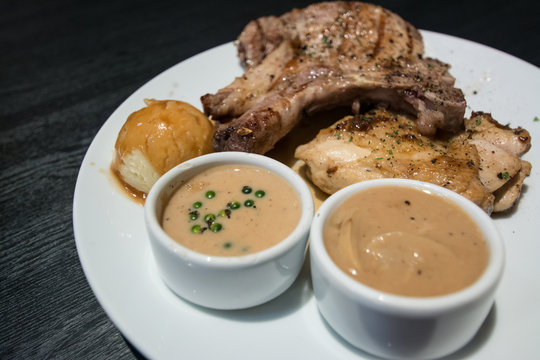 Pork chop and chicken with gravy