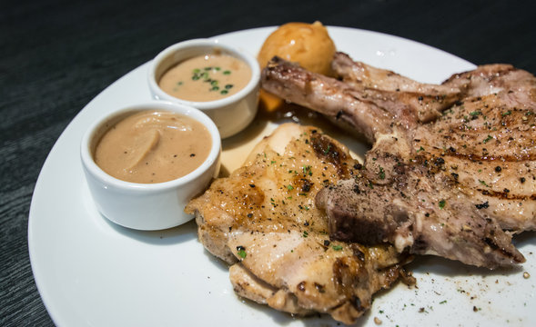 Pork chop and chicken with gravy 