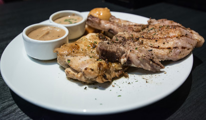 Pork chop and chicken with gravy 