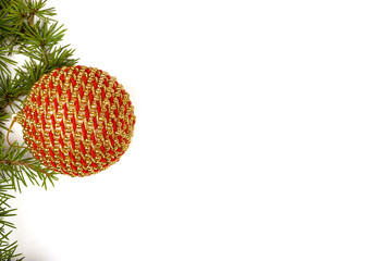 Christmas decoration with green pine or fir and gold round ornam