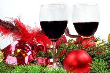Christmas background with glasses of wine and ornaments