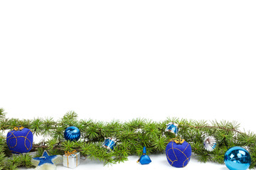 decoration with green pine or fir and blue round ornaments and g