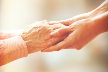 Helping hands, care for the elderly concept - 75313743