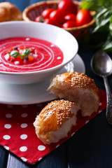 Gazpacho soup on color wooden background