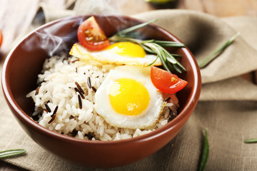 Tasty rice served on table, close-up