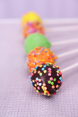 Sweet cake pops on table close-up