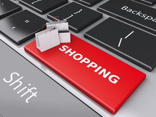 Fototapeta premium 3d Shopping bag on computer keyboard. Online shopping concept.