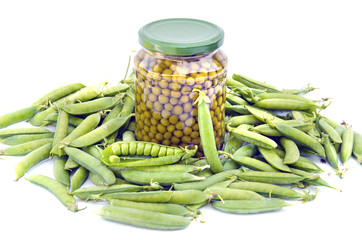 canned green pea in glass jar and fresh pods isolated on white