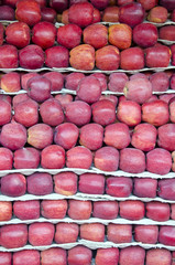 red apples in asia market. Food fruits background