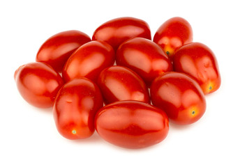 Pile of red grape tomatoes isolated on white in studio