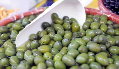 green olives for sale on the market of southern Italy