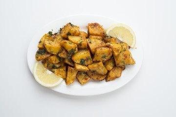 Spicy potato cut in cubes and fried, lebanese cuisine