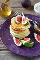 Pancakes with figs on a plate