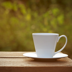 Coffee cup on a wooden table