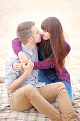 beautiful Couple in love on summer beach