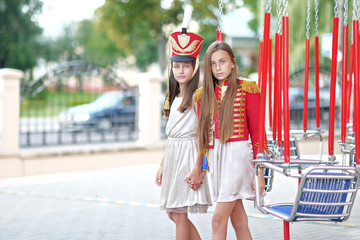 portrait of two girls in the style of hussars