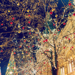 Christmas balls on tree branches in Red square