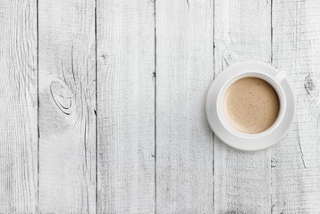 coffee cup top view on white wood table background