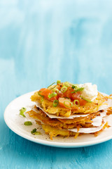 Potato latkes with smoked salmon, green onion and goat cheese