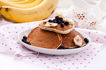Pancakes with oatmeal, banana and blueberries